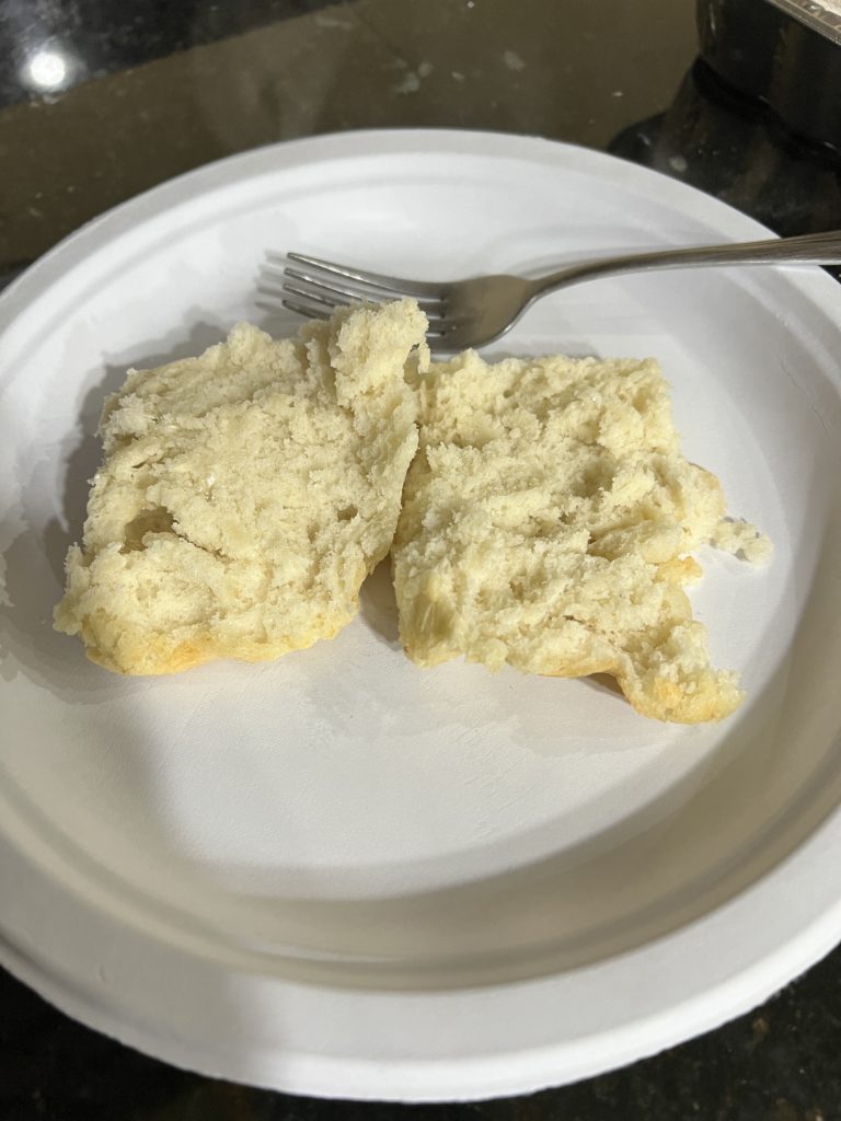 homemade biscuits on a paper plate