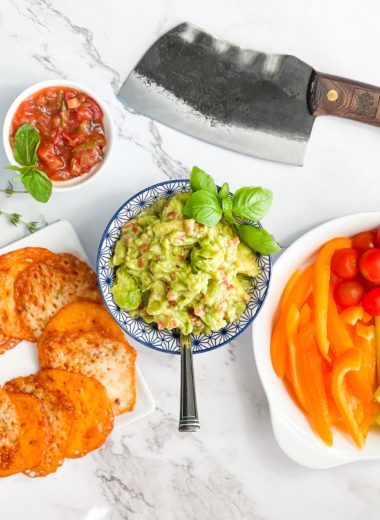 plated flatbread, veggies, and salsa with guacamole